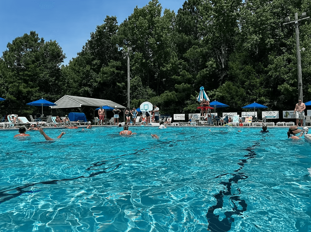 Families enjoying the Atlee Recreation pool on a sunny summer day